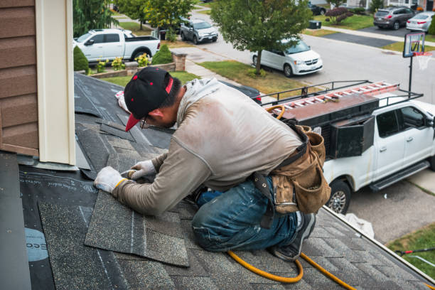 Professional Roofing technician working in Brighton, MA